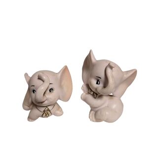 Kitshy vintage pair bisque pink baby elephant figurines